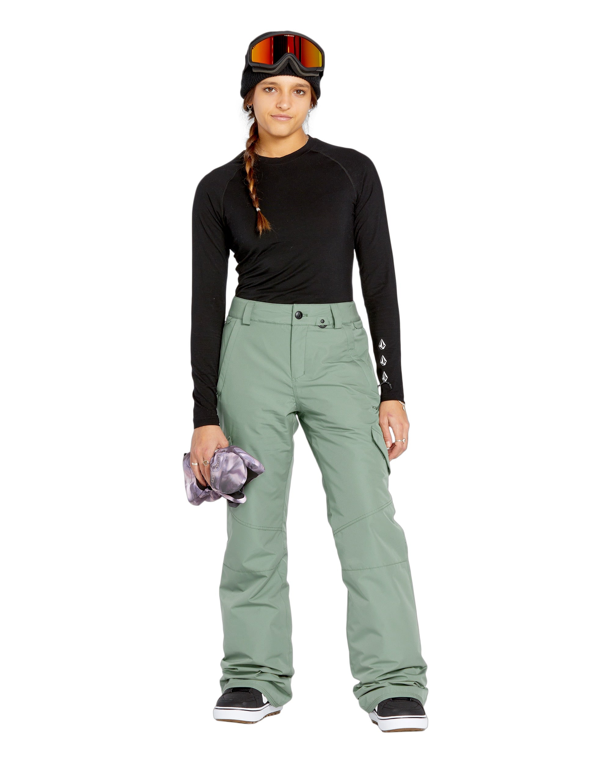 Volcom Women's Bridger Ins Pant 2025 - A pair of sage green snow pants with a zippered pocket on the thigh and adjustable Velcro straps at the waist.