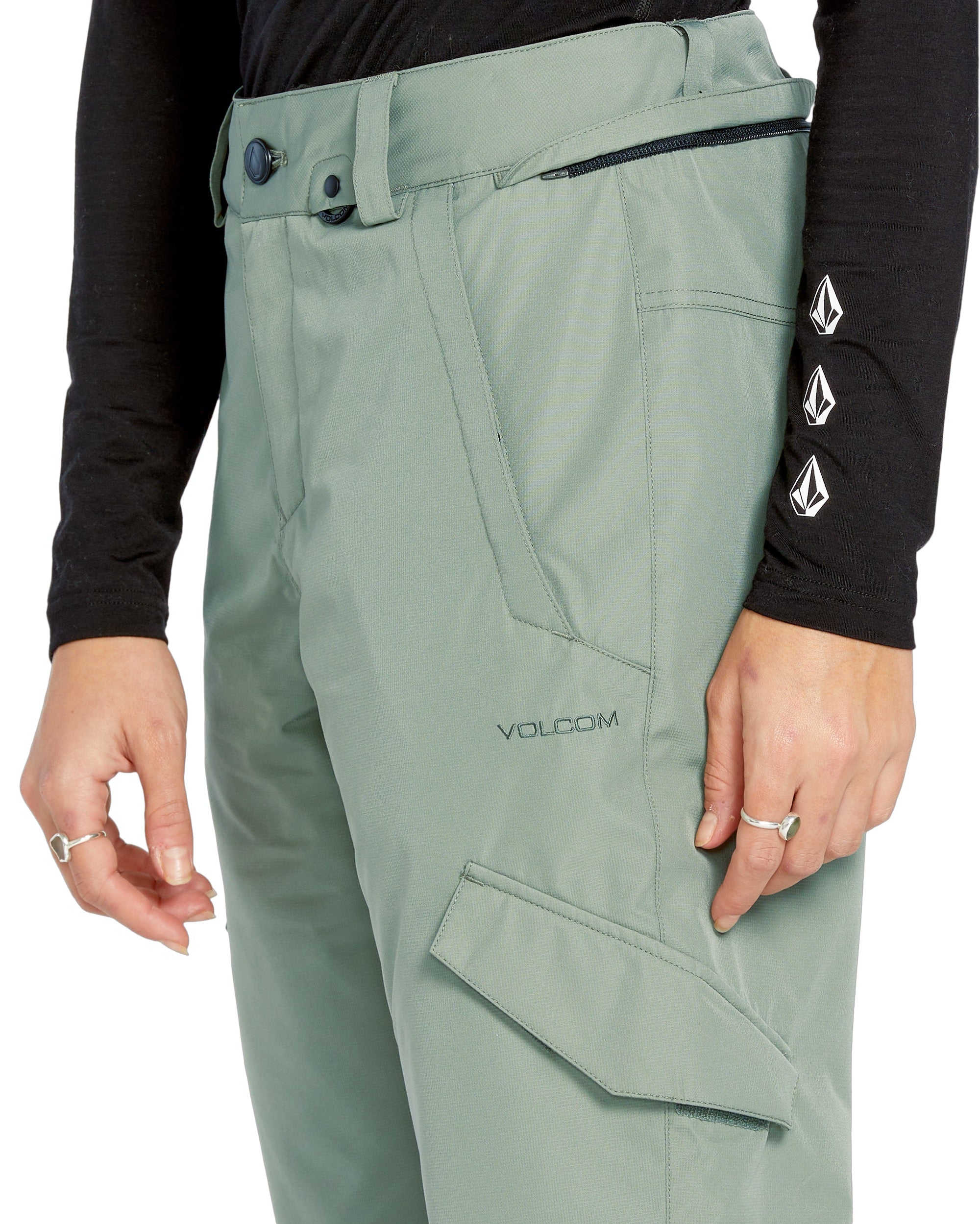 Volcom Women's Bridger Ins Pant 2025 - A pair of sage green snow pants with a black zipper on the waistband.