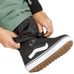 Volcom Women's Bridger Ins Pant - Black snowboard pants with a subtle pattern of small, dark gray dots on the upper thigh area.