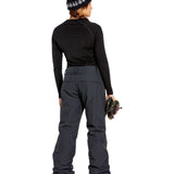 Volcom Women's Frochickie Insulated Pant - Black snow pants with a white logo on the left thigh and a zippered pocket on the right hip.