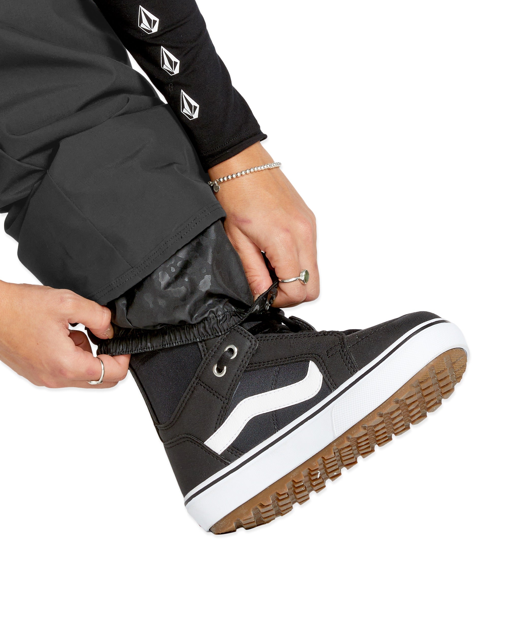 Volcom Women's Frochickie Insulated Pant - Black insulated snow pants with a subtle white pattern on the left leg.