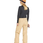 Volcom Women's Frochickie Insulated Pant - A pair of tan snow pants with a zippered pocket on the side and a drawstring at the waist.