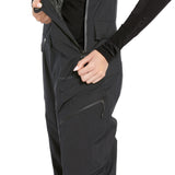 Volcom Women's Elm Stretch GORE-TEX Bib Overall - Black bib overall with a zippered front and two zippered pockets on the side.