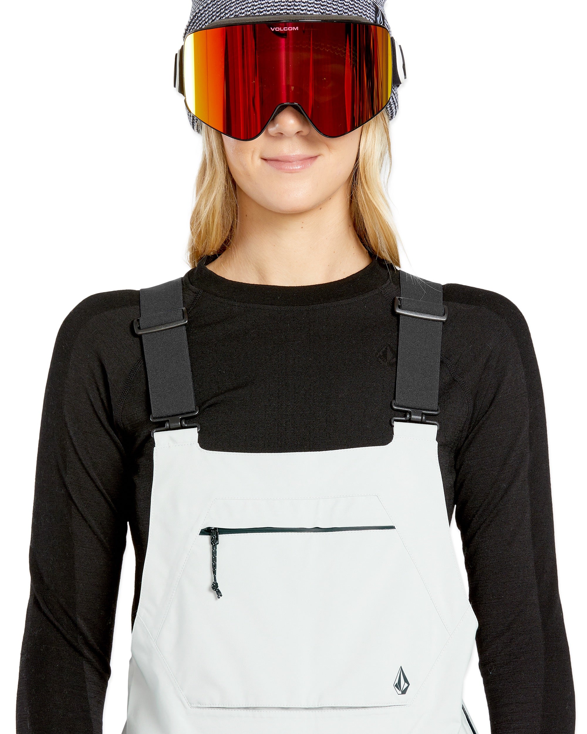 Volcom Women's Elm Stretch GORE-TEX Bib Overall - A pair of white snow pants with a black zipper and adjustable straps.