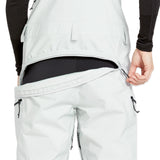 Volcom Women's Elm Stretch GORE-TEX Bib Overall - A pair of white snow pants with a black waistband and adjustable straps.