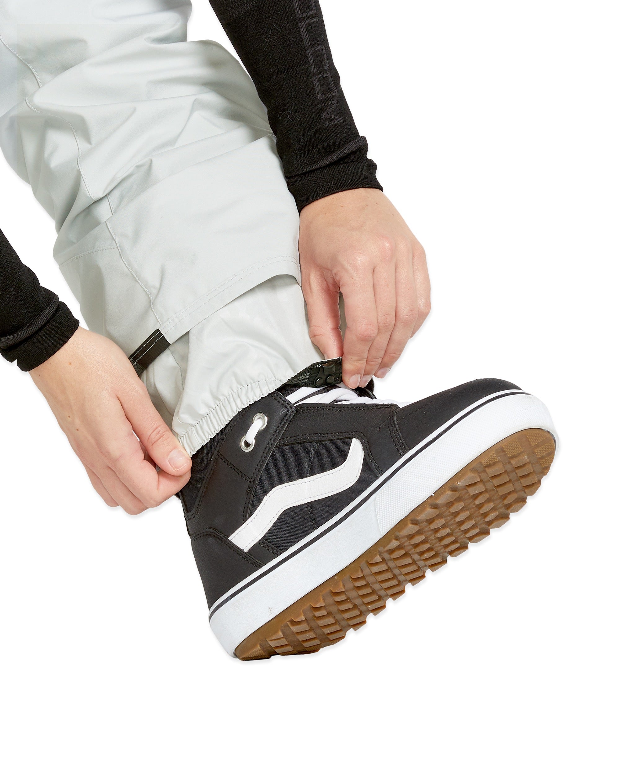 Volcom Women's Elm Stretch GORE-TEX Bib Overall - A pair of snowboard pants with a black and white color scheme, featuring a stretchy material and a GORE-TEX bib design.