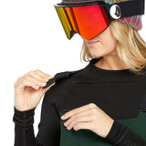 Volcom Women's Elm Stretch GORE-TEX Bib Overall - A pair of green snowboard pants with a stretchy material and a GORE-TEX logo on the left leg.