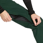 Volcom Women's Elm Stretch GORE-TEX Bib Overall - Dark green bib overall with black hardware and a zippered fly.