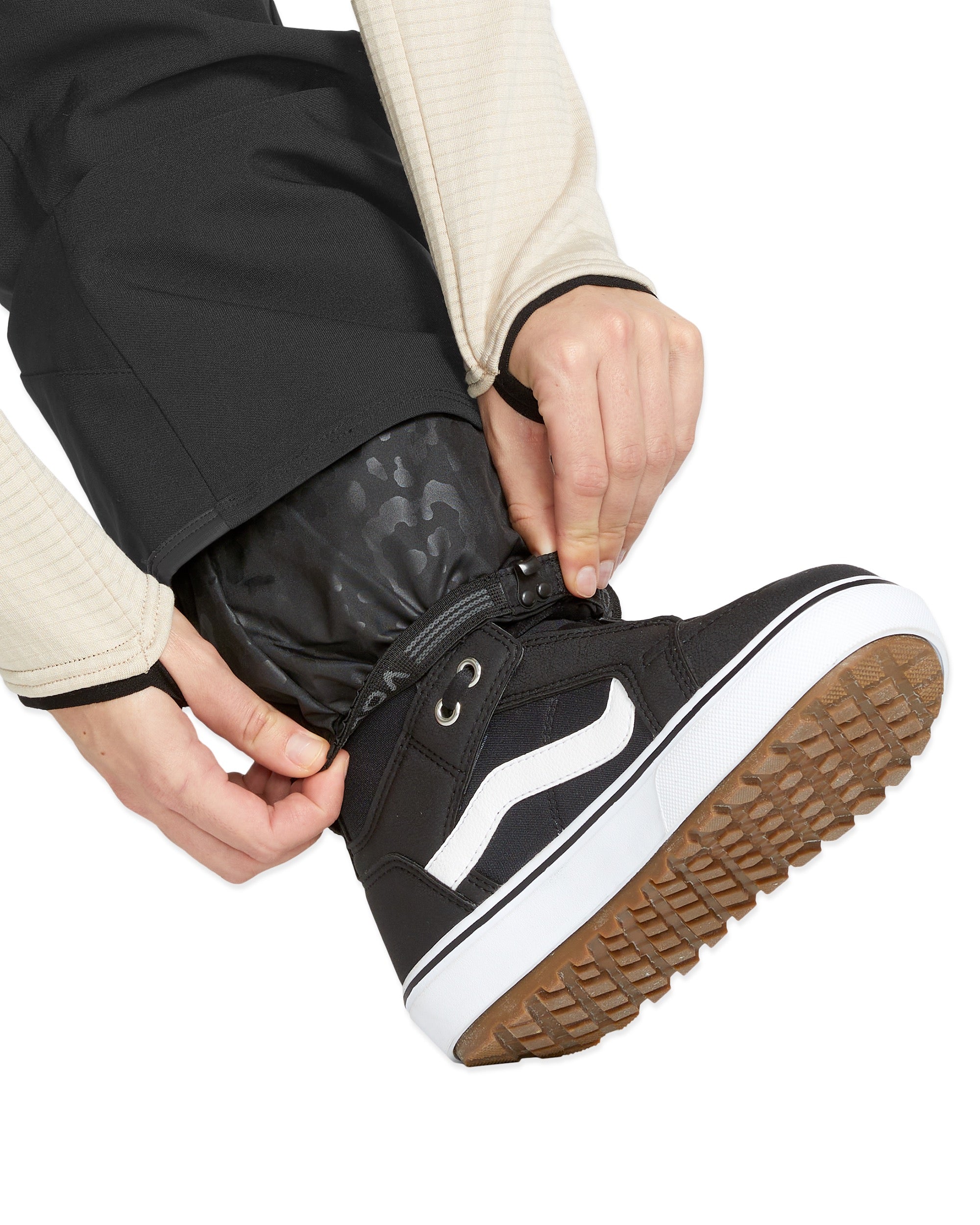 Volcom Women's Swift Bib Overall - Black bib overall with white logo on left thigh and black drawstring waistband.