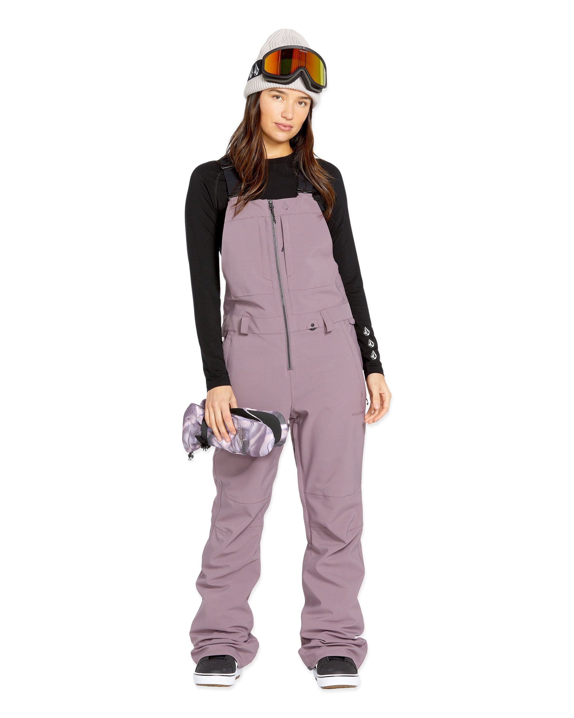 Volcom Women's Swift Bib Overall - A dusty rose bib overall with a zippered fly and two front pockets.