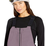 Volcom Women's Swift Bib Overall - A pair of bib overalls in a solid black color with adjustable straps and multiple pockets.