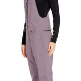 Volcom Women's Swift Bib Overall - A pair of bib overalls in a solid black color with adjustable straps and multiple pockets.