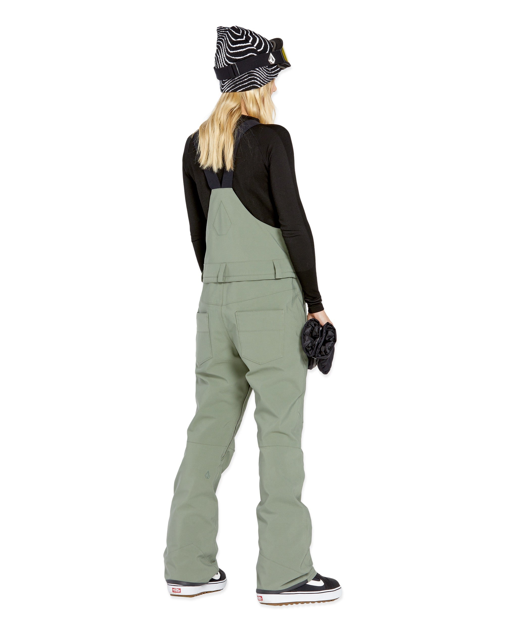 Volcom Women's Swift Bib Overall - Sage green bib overalls with a geometric pattern on the side pocket and black straps.