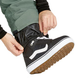 Volcom Women's Swift Bib Overall - A pair of black snow pants with a subtle white pattern and a zippered pocket on the thigh.