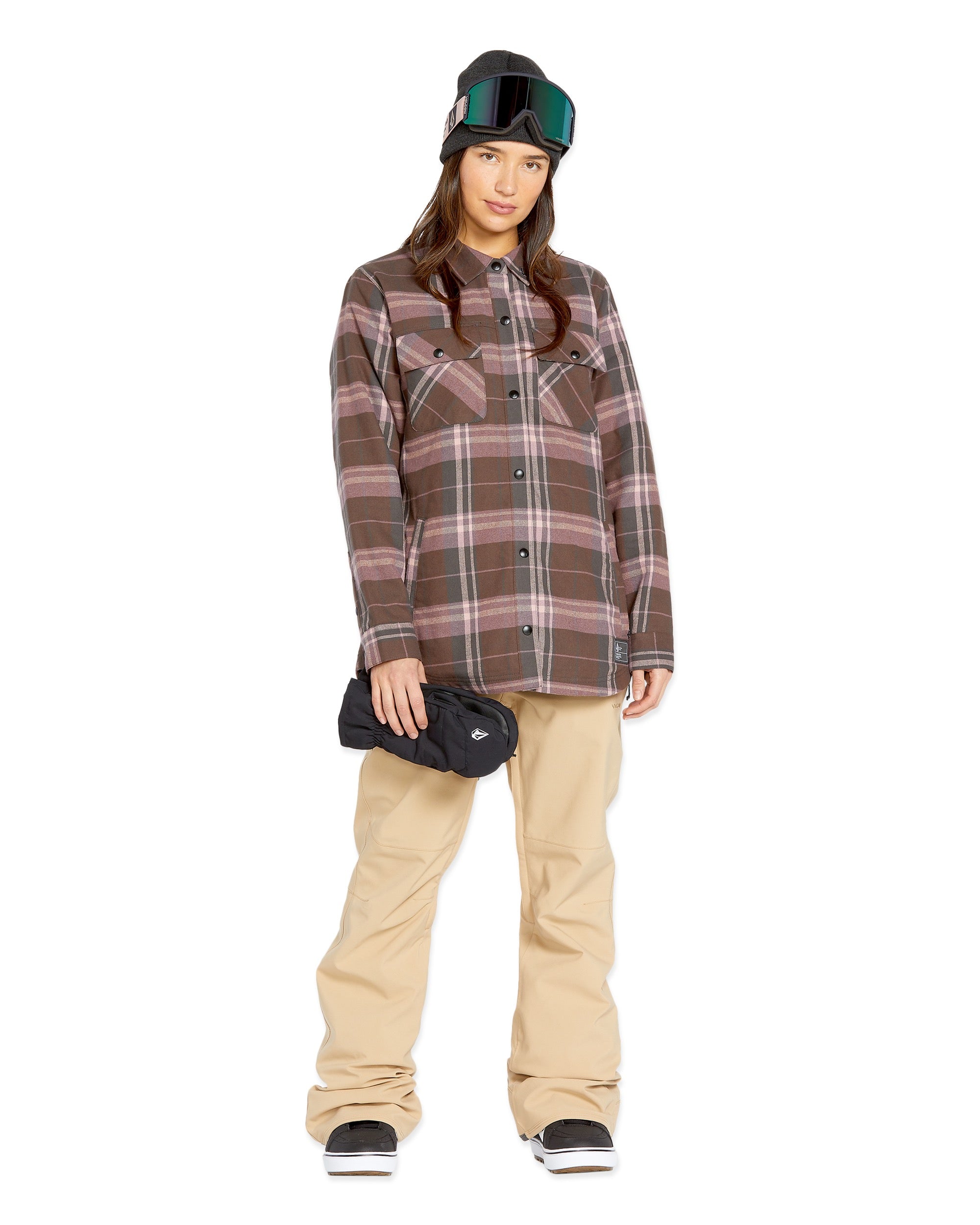 Volcom Women's Swift Bib Overall - A brown overall with a white stripe on the side of the leg and two zippered pockets at the front.