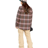 Volcom Women's Swift Bib Overall - A brown overall with a white logo on the left thigh and a black zipper running down the front.