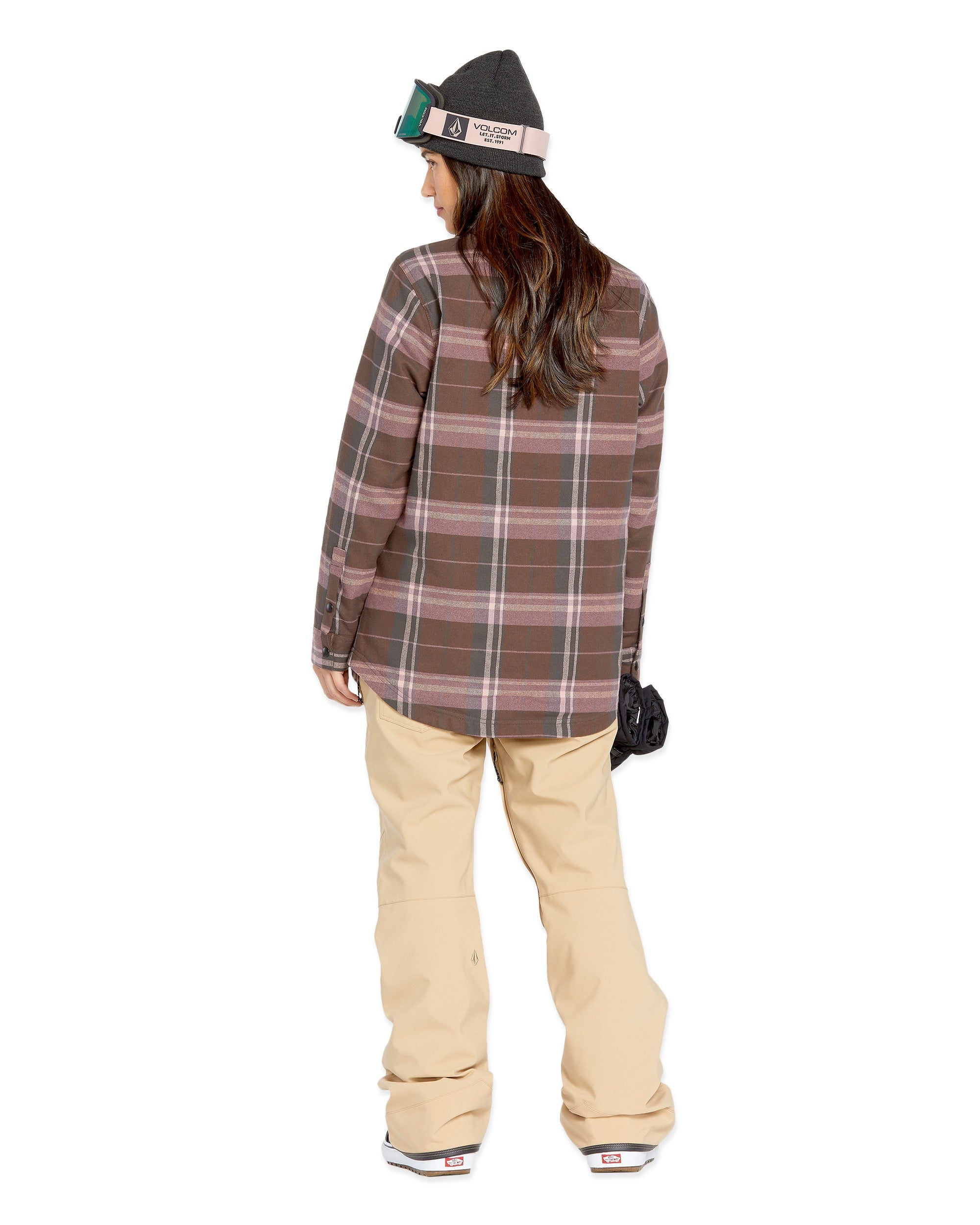 Volcom Women's Swift Bib Overall - A brown overall with a white logo on the left thigh and a black zipper running down the front.