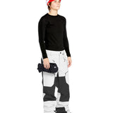 Volcom Women's Stone Mica 20K Pant - Black snow pants with a geometric pattern on the left leg and white accents on the right leg.