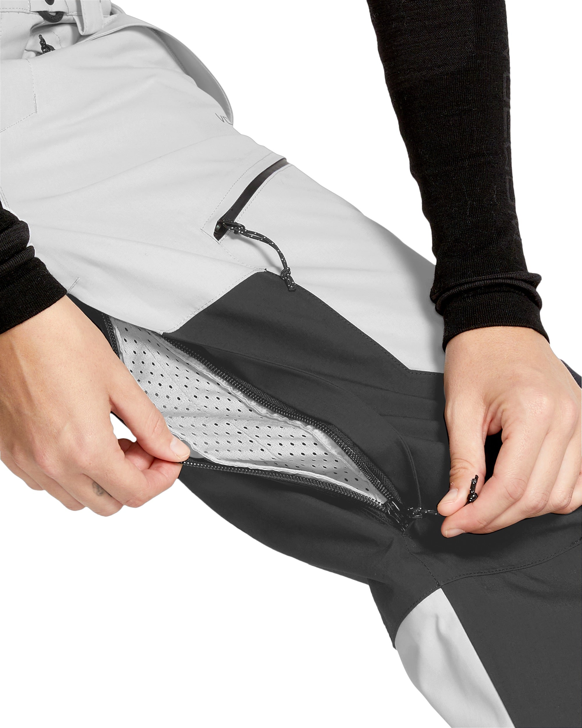 Volcom Women's Stone Mica 20K Pant - A pair of black and white snow pants with a zippered pocket on the side.