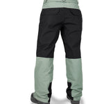 Volcom Women's Stone Mica 20K Pant - Black pants with a subtle green stripe down the side and black zippers on the leg openings.