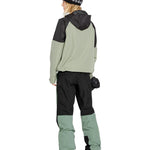 Volcom Women's Stone Mica 20K Pant - A sage green and black snow pant with a zippered pocket on the side of the leg.