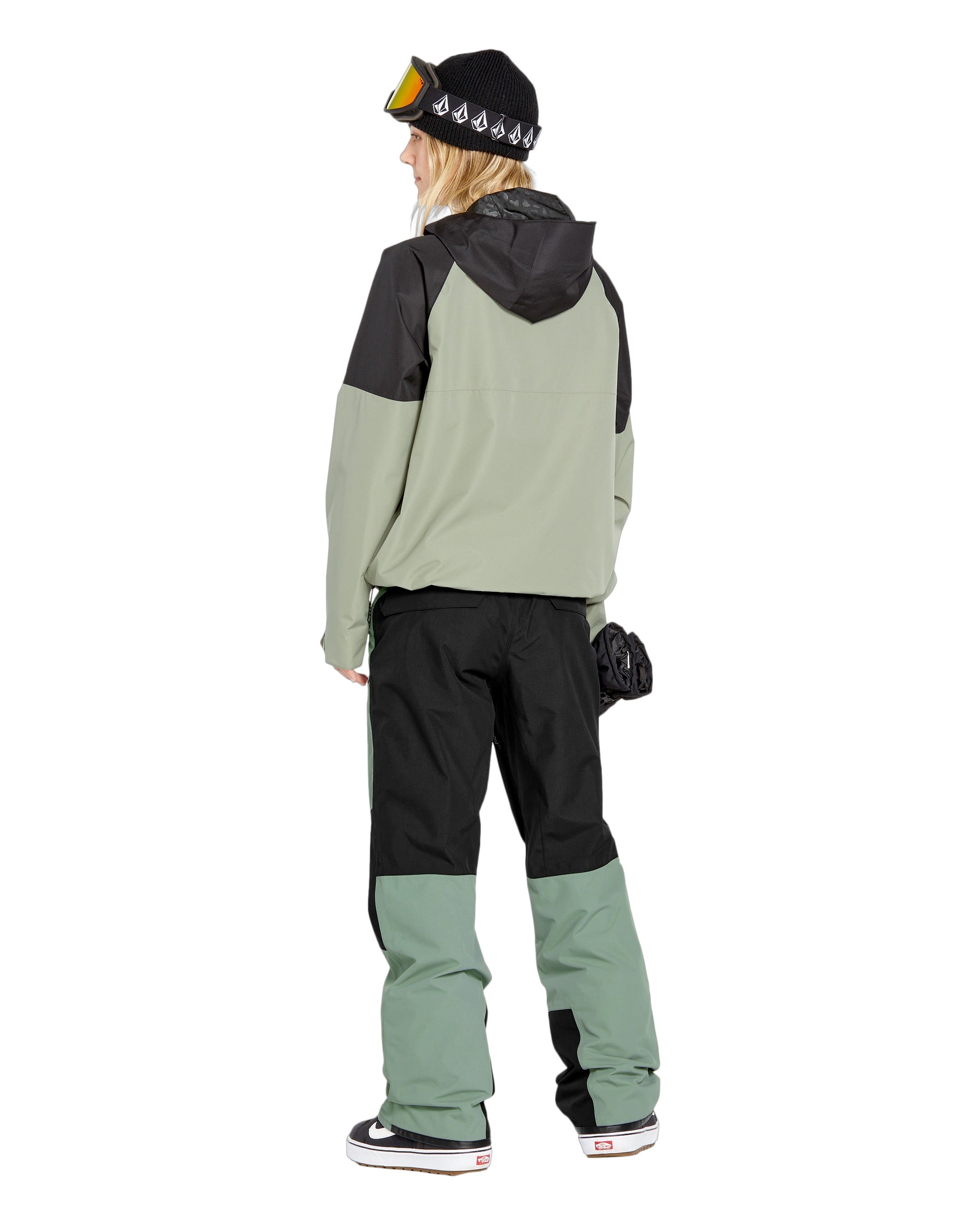 Volcom Women's Stone Mica 20K Pant - A sage green and black snow pant with a zippered pocket on the side of the leg.
