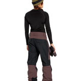 Volcom Women's Stone Mica 20K Pant - Black snow pants with a subtle mottled pattern and brown accents on the side pockets, belt loops, and lower leg cuffs.