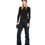 Volcom Women's Genus Stretch Pant 2025 - Black snow pants with a subtle white stripe down the side of each leg.