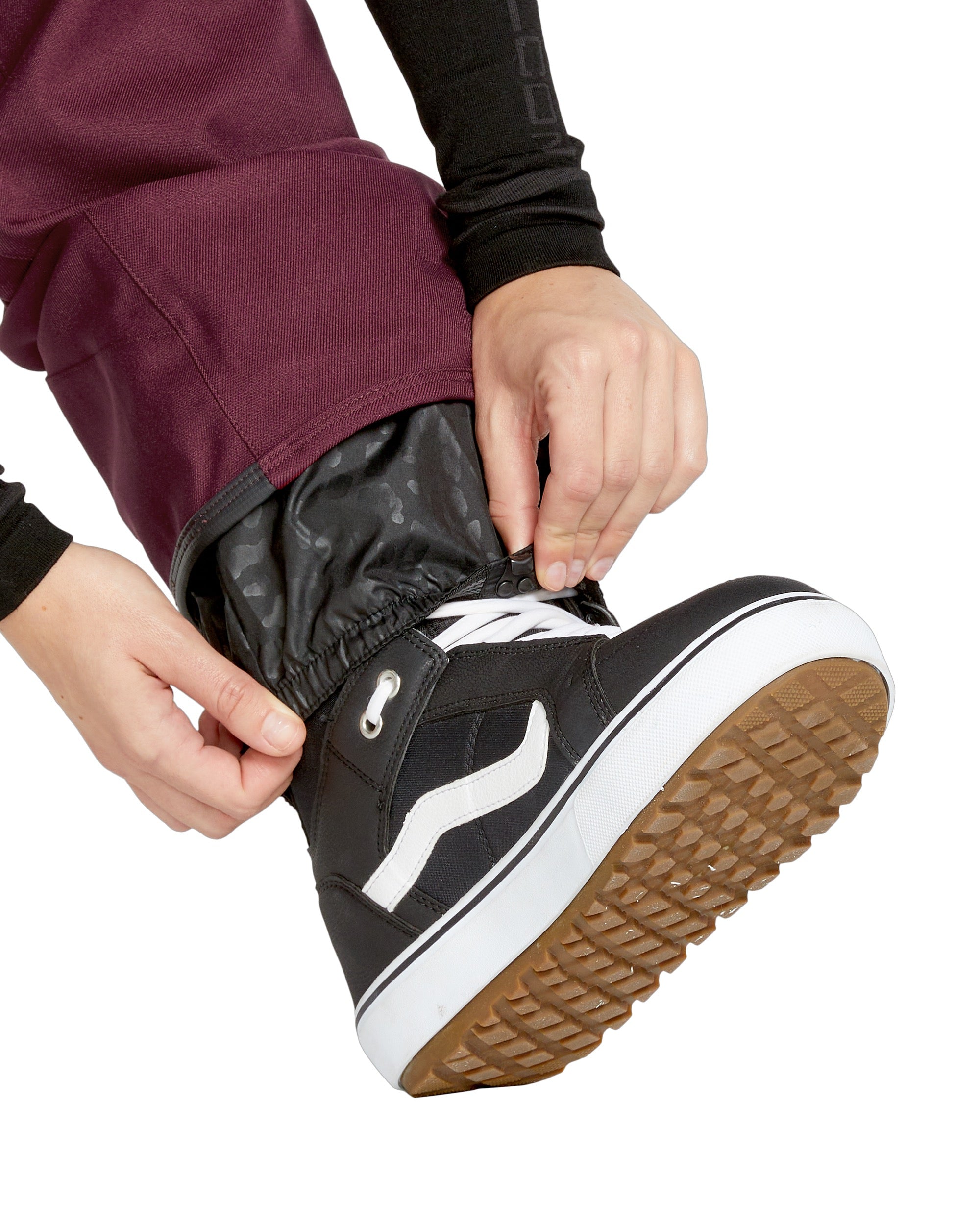 Volcom Women's Genus Stretch Pant 2025 - Black snowboard pants with a subtle floral pattern on the side of the leg.