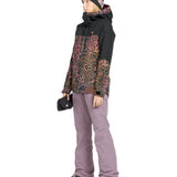 Volcom Women's Hallen Shell Pant - A black snow pant with a subtle leopard print pattern on the upper thigh area.