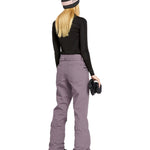 Volcom Women's Hallen Shell Pant - A pair of black snow pants with a zippered pocket on the thigh and a logo patch on the left leg.