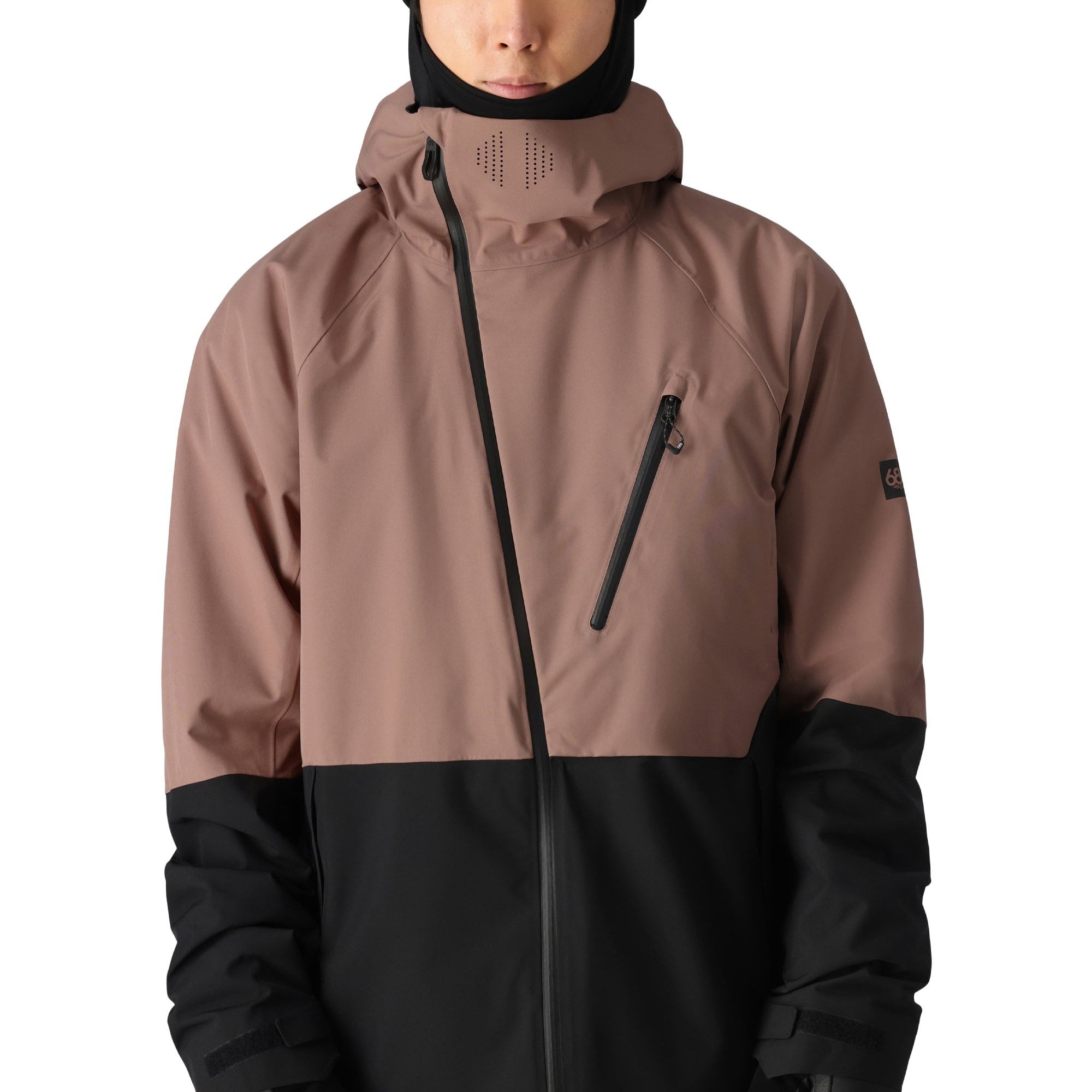 The 686 Hydra Thermagraph Jacket appears to be a brown and black color-blocked jacket with an insulated hood.