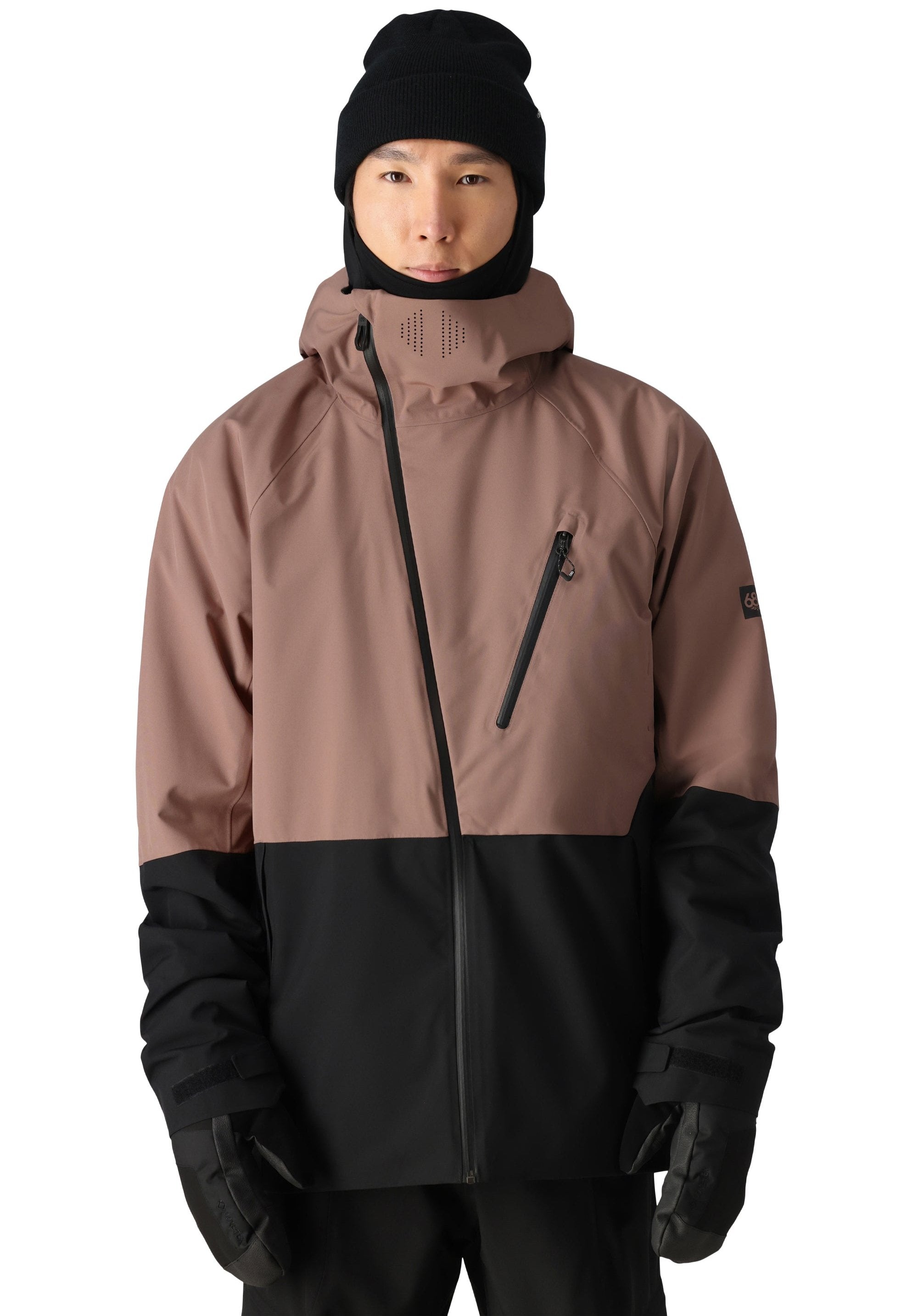 The 686 Hydra Thermagraph Jacket appears to be a brown and black color-blocked jacket with an insulated hood.