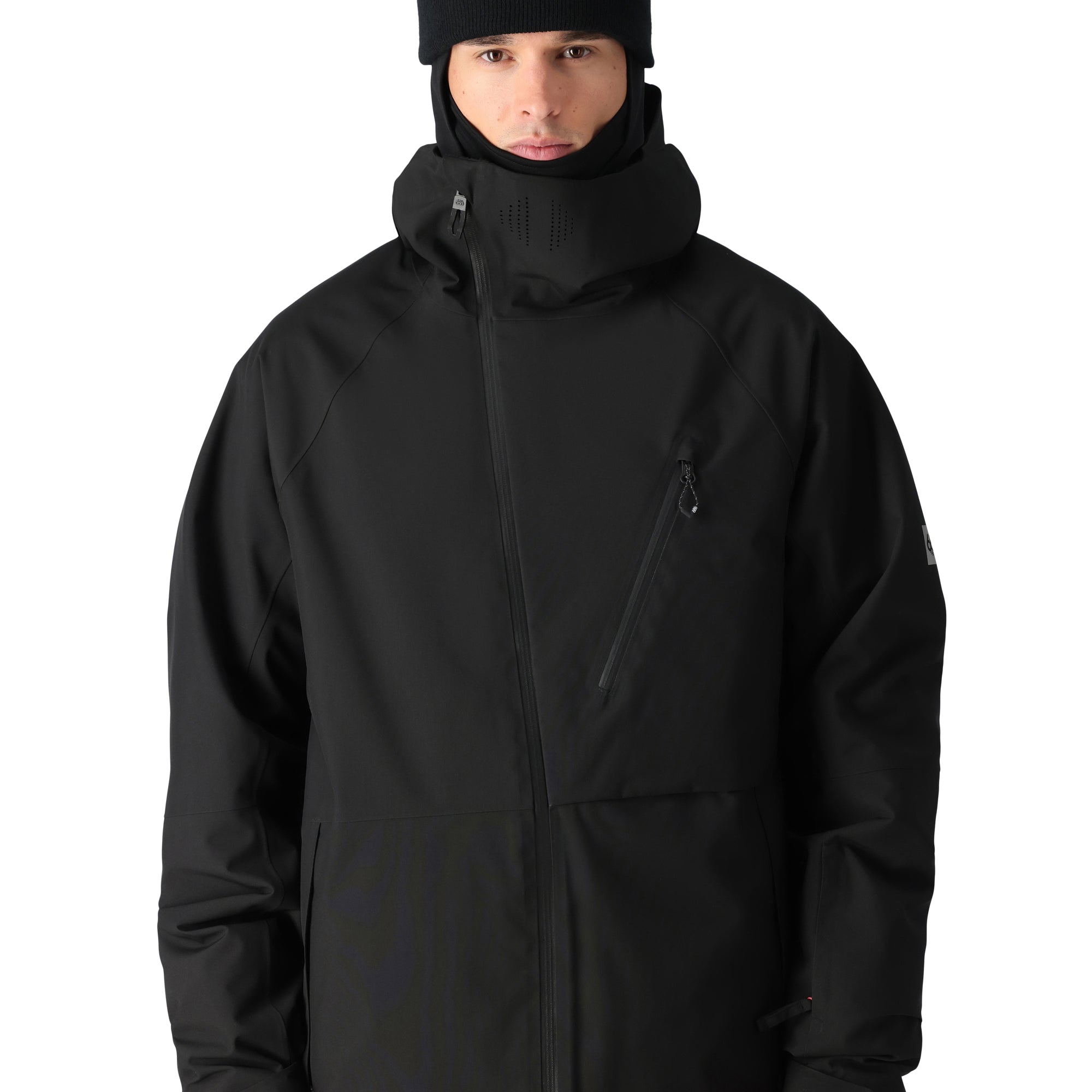 The 686 Hydra Thermagraph Jacket 2025 is black with an insulated hood and zippered pockets on both sides.