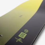 Endeavor Rover QSL Snowboard 2025 - A black snowboard with a yellow patterned top and a small circular logo near the tip.