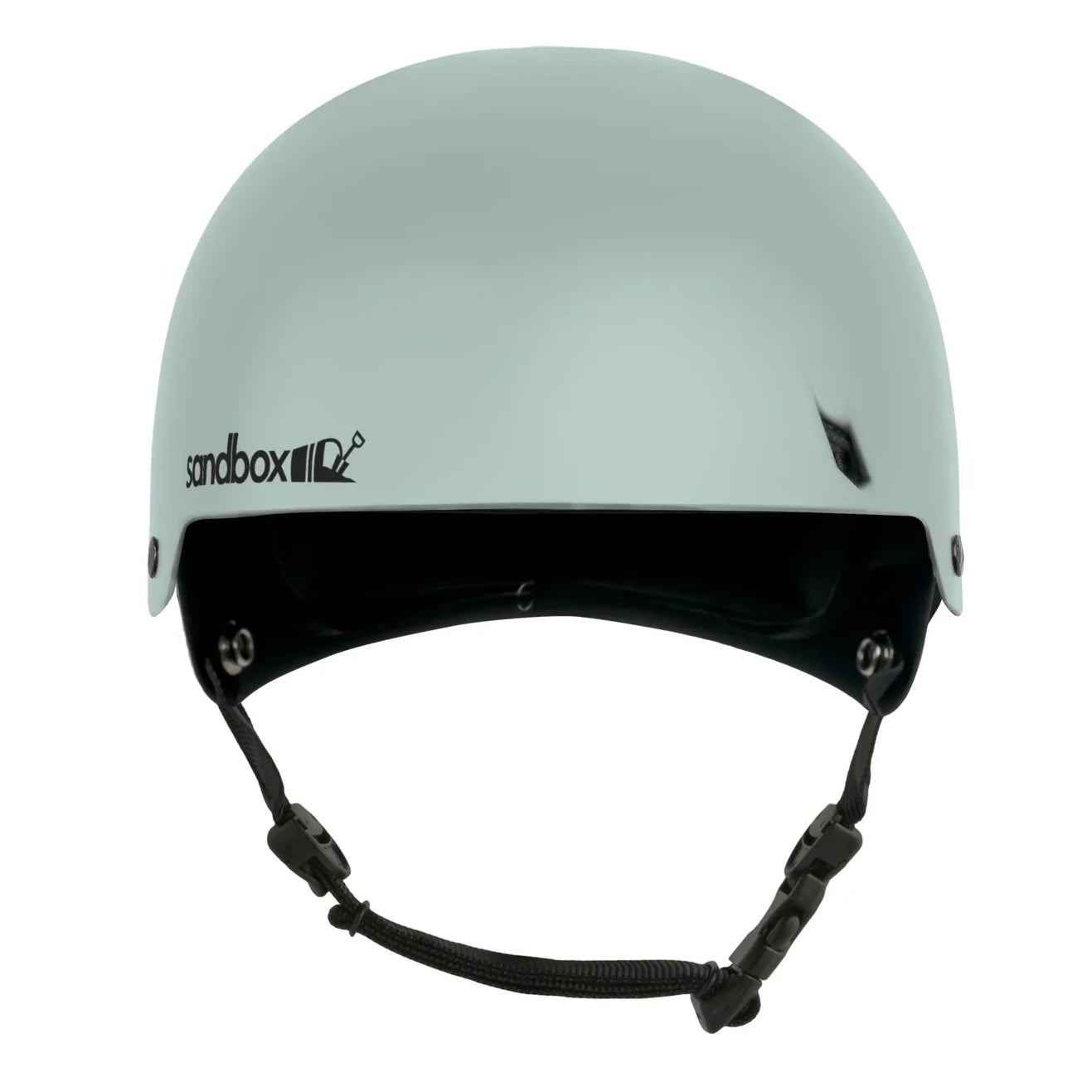 Sandbox Icon Brain Bucket Helmet 2025 - A white helmet with a black chin strap and a small logo on the front that says "sandbox" in gray letters.