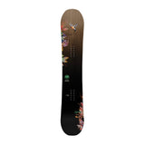 Never Summer Women's Infinity Snowboard 2025 - A black snowboard with a gradient brown top, featuring a bird in flight and floral designs on the edges.