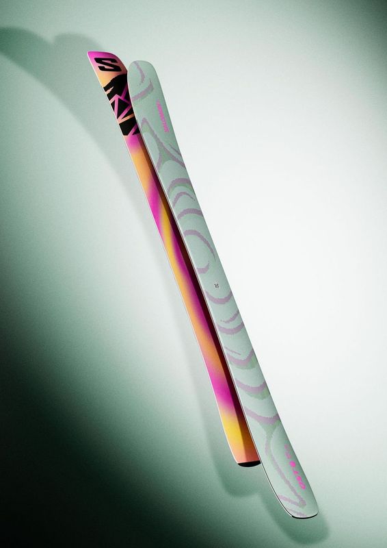 Salomon QST 100 Skis 2026 - A pair of skis with a black and white pattern on the top, featuring a distinctive "S" logo at the tip.