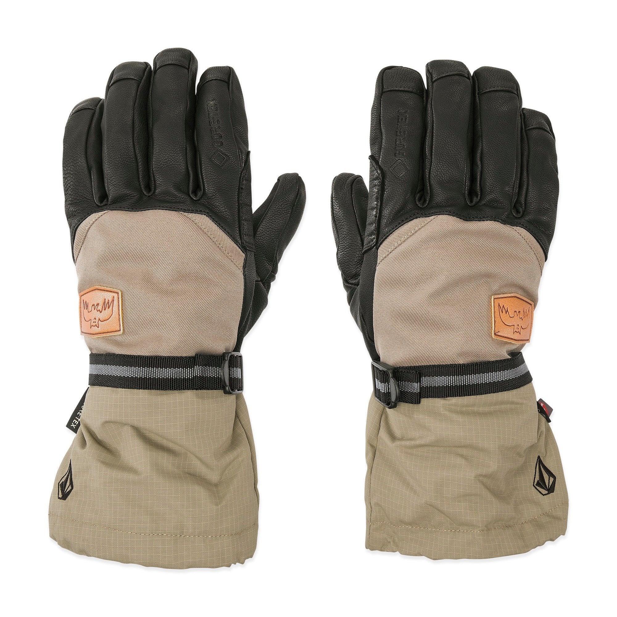 Volcom Men's 91 GORE-TEX Glove - A tan glove with a brown leather palm and wrist strap, featuring a small black logo on the back of the hand.