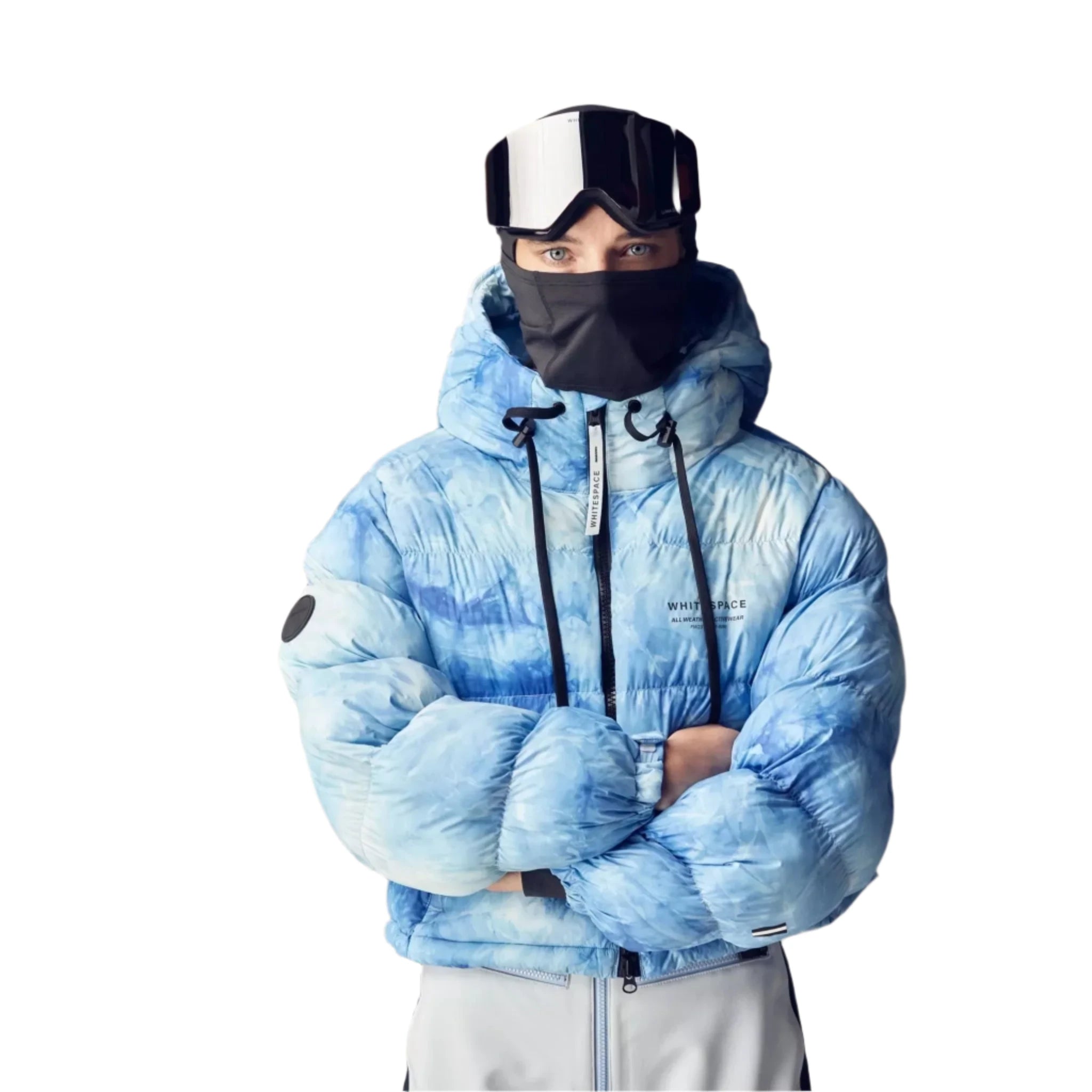 Whitespace Women's Cropped Puffer Jacket 2024 - A cropped-length puffer jacket in a light blue and white tie-dye pattern.
