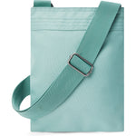 Dakine Jive Crossbody Bag 2025 - A light blue crossbody bag with a zippered pocket on the front and adjustable strap.