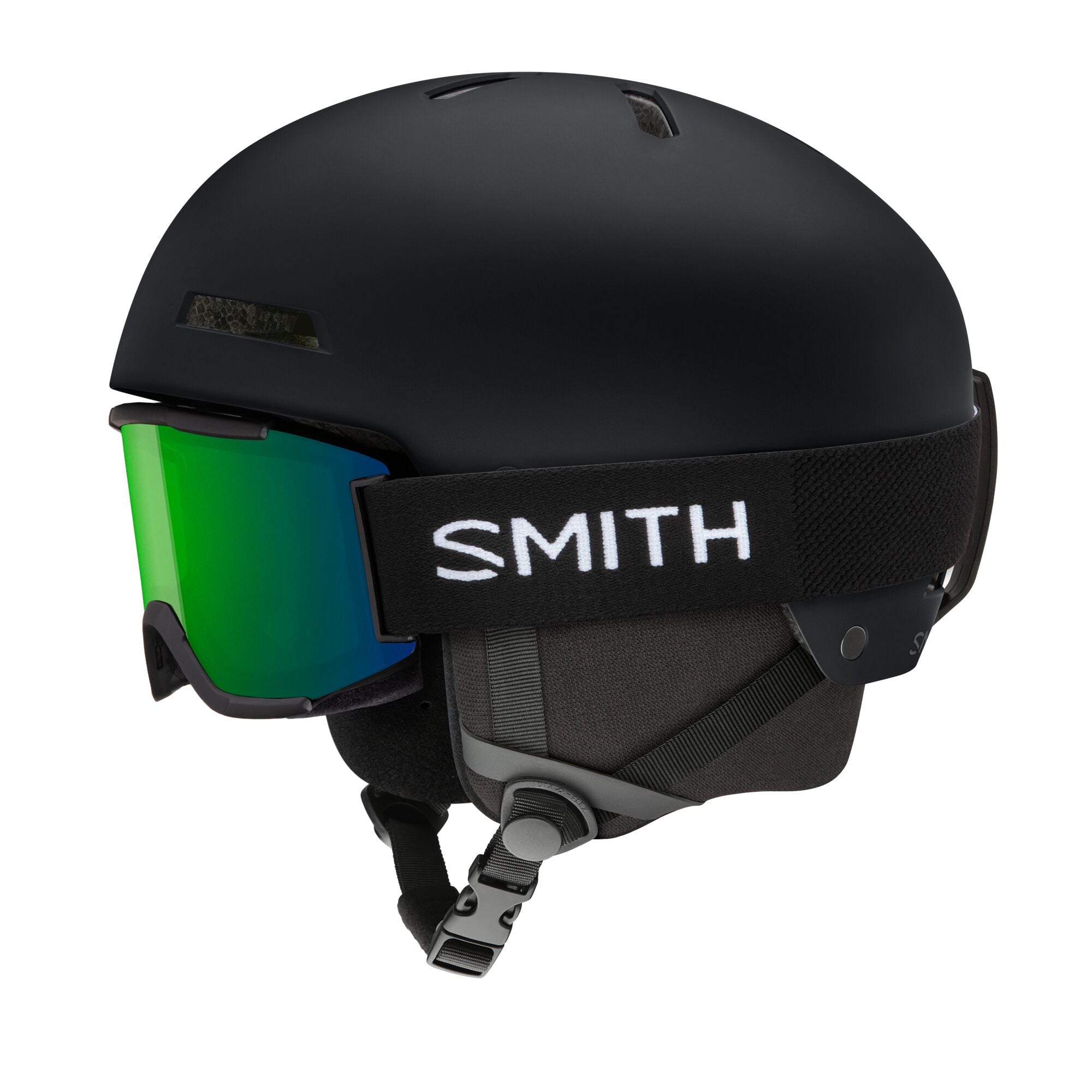 Kids MIPS ski helmet, matte black, side view with green-tinted goggle lens