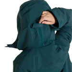 Burton Junior's Ascutney 2L Insulated Jacket 2025 - A dark green jacket with a hood, featuring two zippered pockets on the front and a zipper closure down the center.