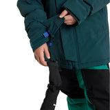 Burton Junior's Ascutney 2L Insulated Jacket 2025 - A dark green jacket with a blue logo on the left chest and two zippered pockets on the front.