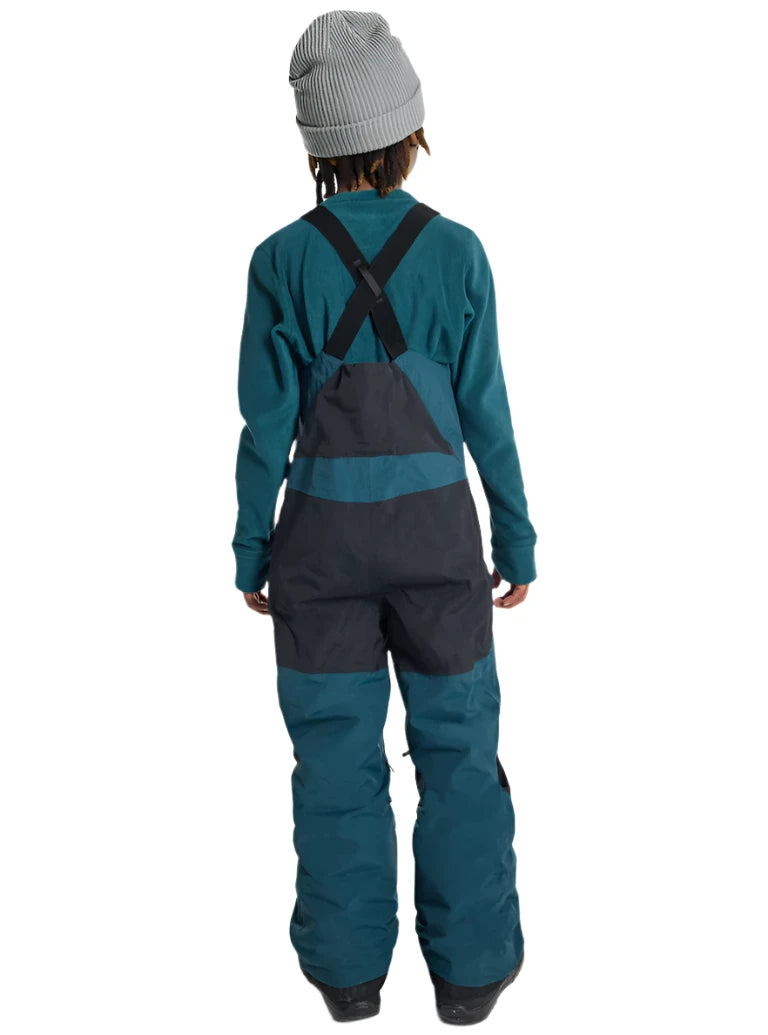 Burton Junior's Skylar 2L Bib Pant 2025 - A pair of dark blue snow pants with a black bib and adjustable straps.