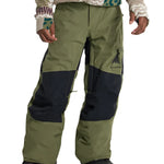 Burton Junior's Skylar 2L Pant 2025 - Olive green snow pants with a black stripe down the side and zippered pockets.