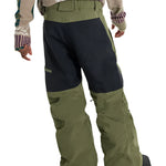 Burton Junior's Skylar 2L Pant 2025 - A pair of olive green snow pants with a black stripe down the side and a small logo on the left leg.