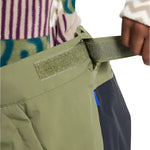 Burton Junior's Skylar 2L Pant 2025 - Olive green pants with a small blue logo on the left leg.