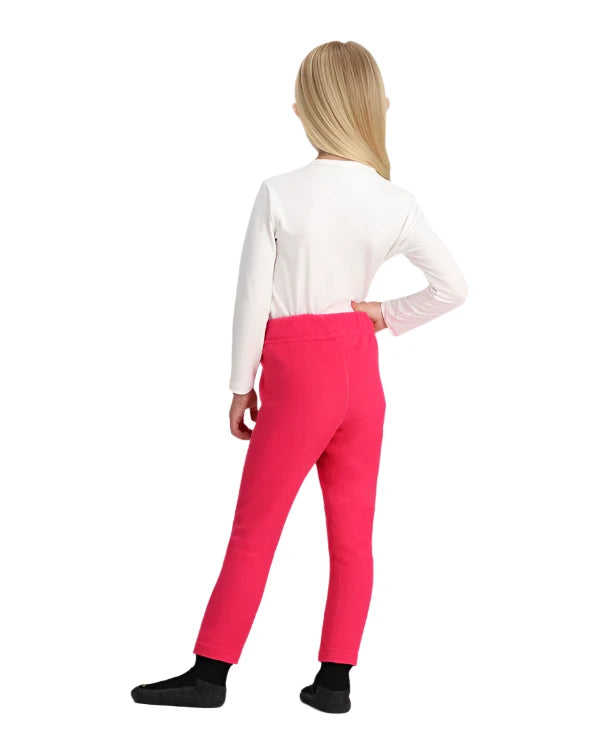 Obermeyer Junior's Ultra Gear Pant 2025 - A pair of bright pink ski pants with a white logo on the left leg.