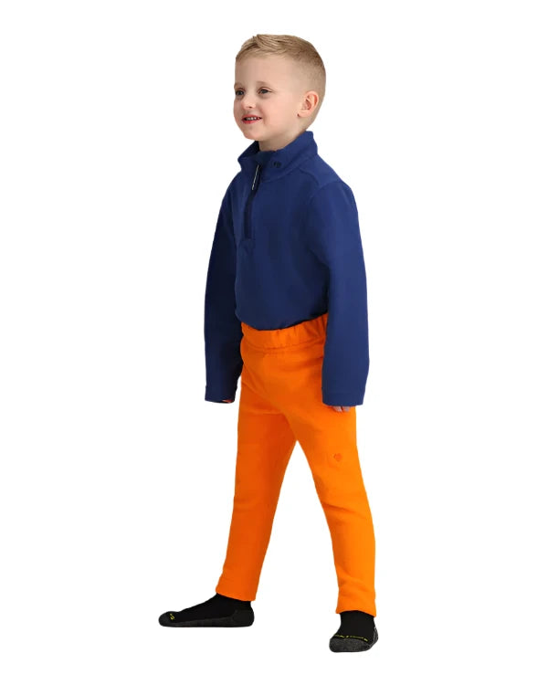 Obermeyer Junior's Ultra Gear Pant 2025 - A pair of orange ski pants with a black zipper on the left leg.